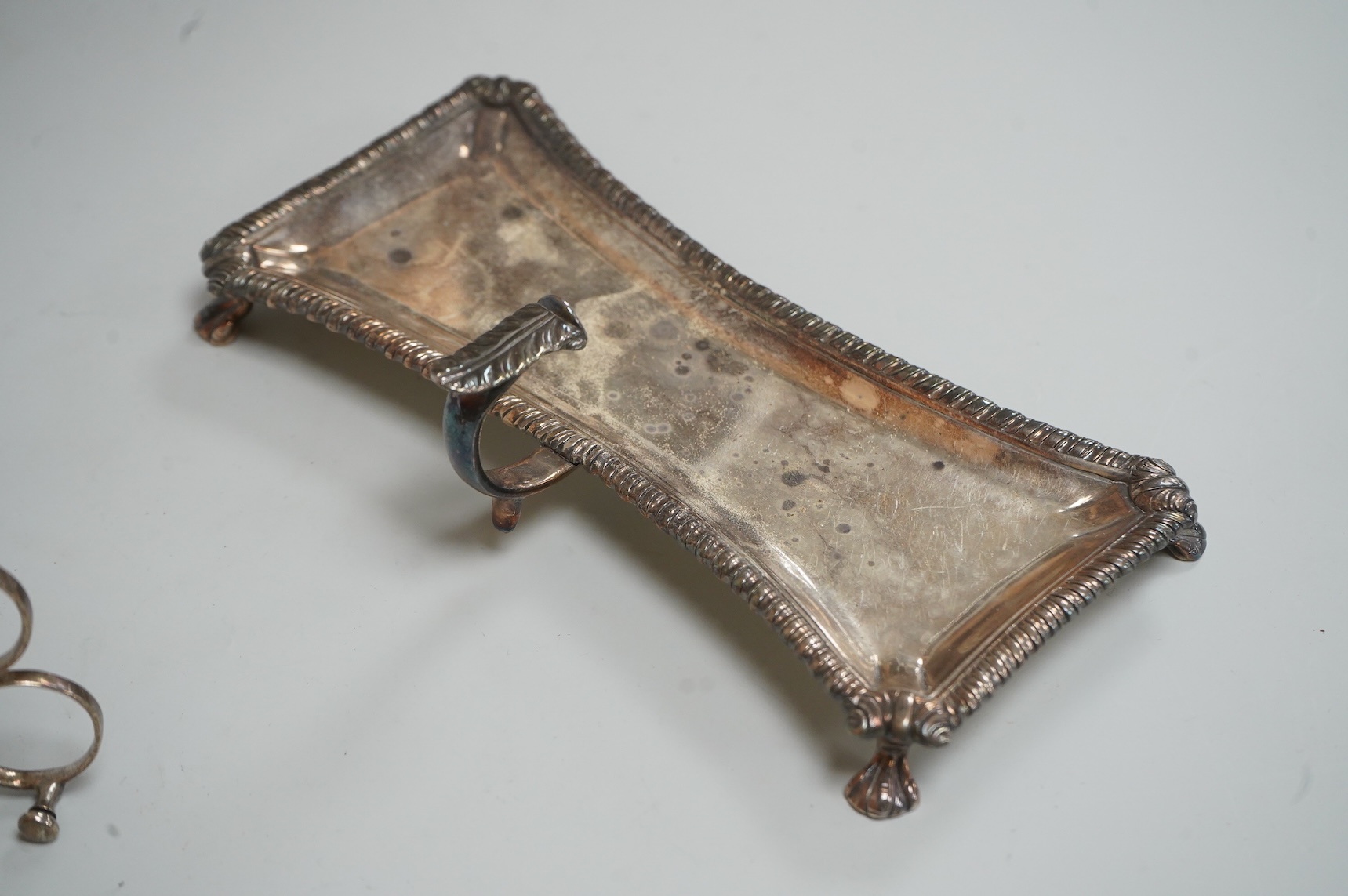 A pair late George II silver candle snuffers and similar stand, stand WC?, London, 1769, 18.5cm, snuffers I.B, London, 1769, 9oz.